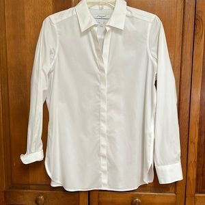 Foxcroft size 4 white top.  Hidden buttons.